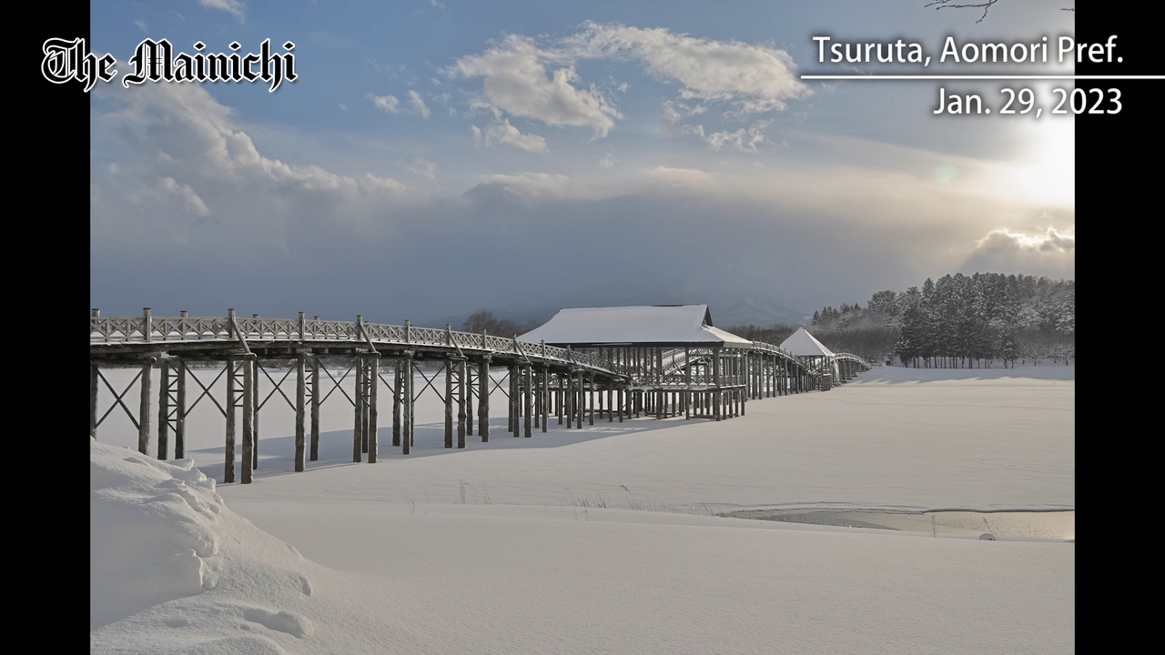 Northern Japan lake crowned by Japan's longest wooden bridge